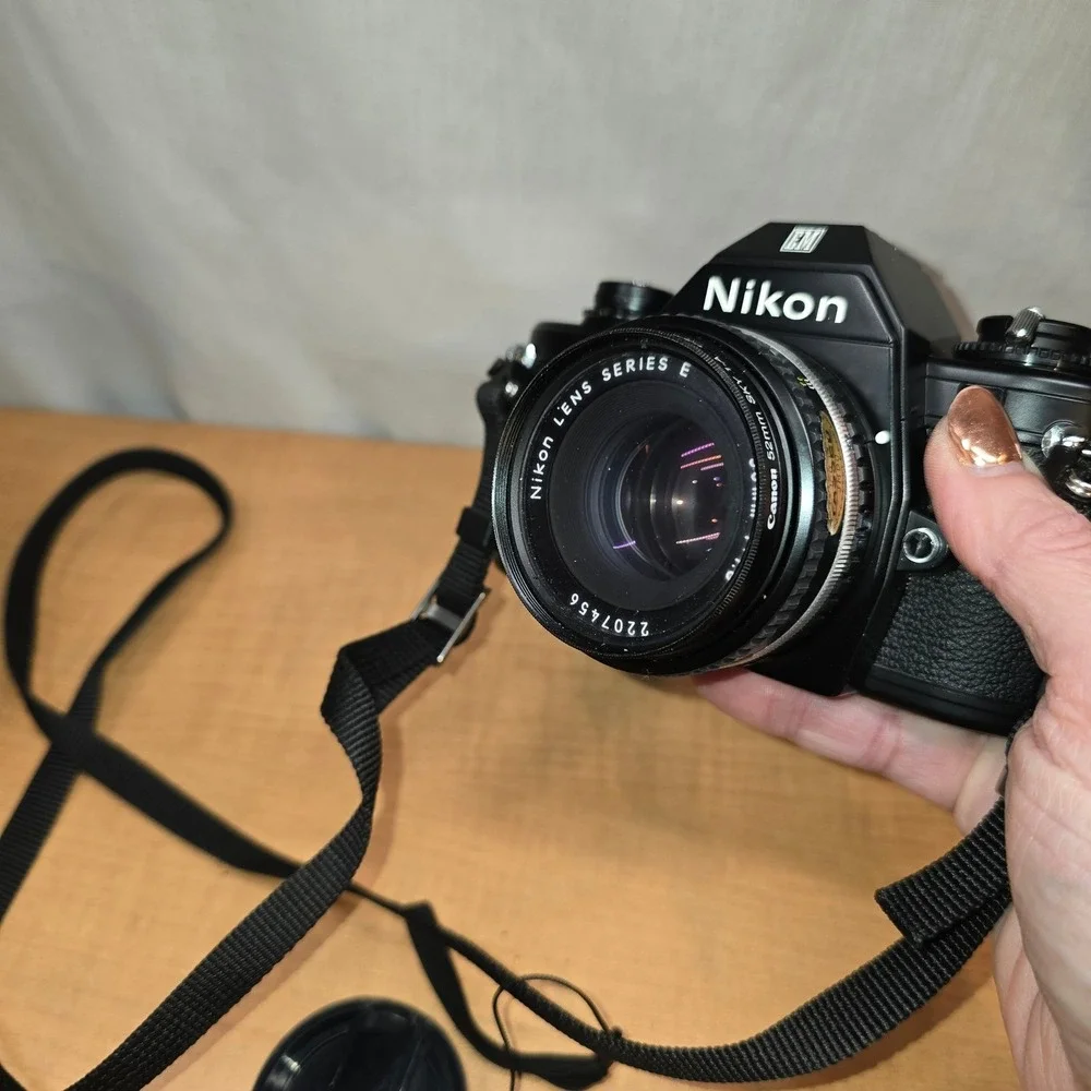 Nikon‎ EM 35mm Camera body lens series e flash cases for camera manuals timer